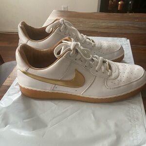 Men’s Nike Air Force Ones white and gold gum sole 11.5